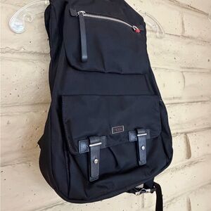 Tumi Black Backpack with Silver Accents